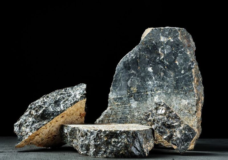 Foliation - You can see the distinctive banded or layered appearance, especially in the larger specimens