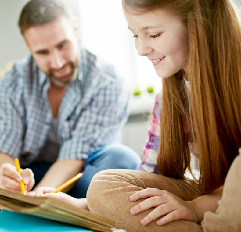 Parent and child studying together